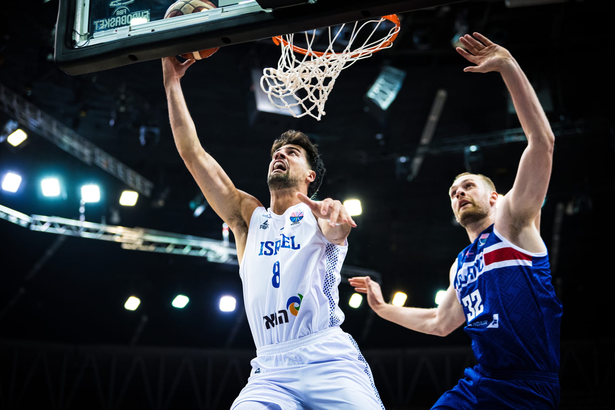 Israel pull away from feisty Iceland for Group D opener win