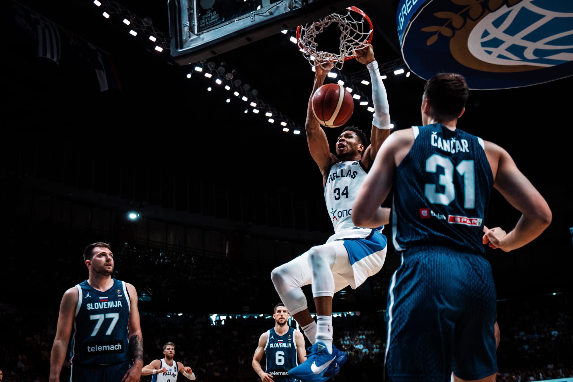 Greek defense stifles Slovenia, hosts clinch Final berth in style