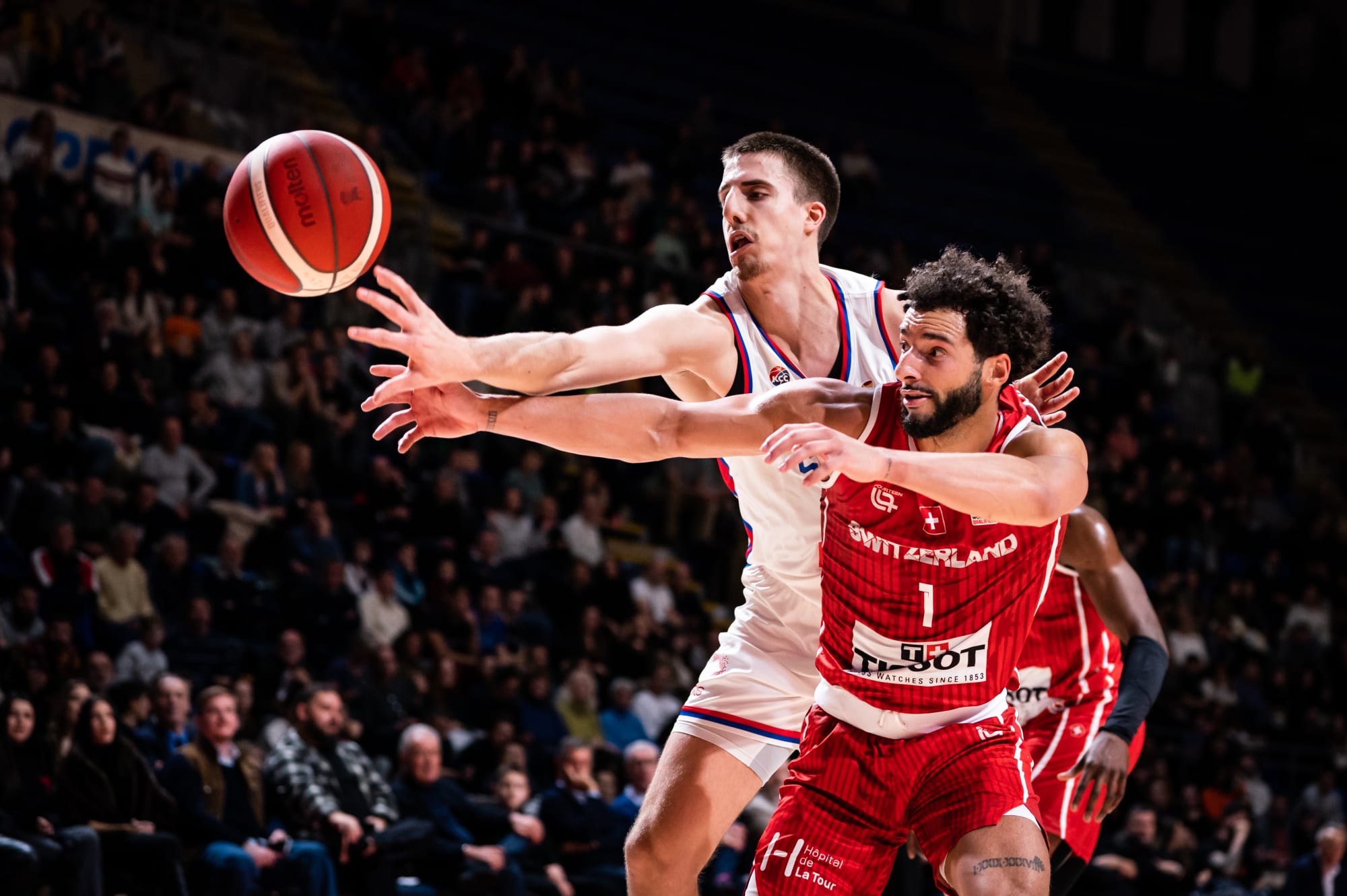 Serbia survive Swiss scare with 23-point comeback