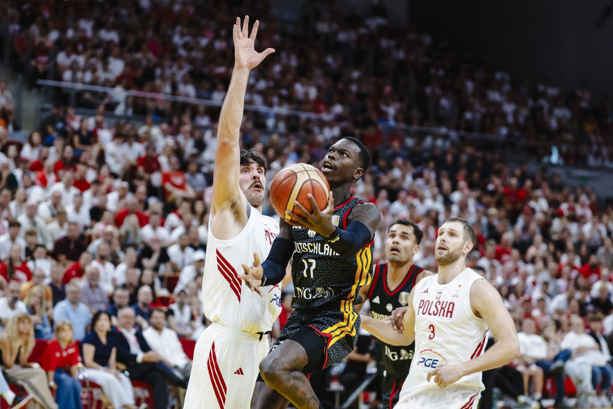 OT drama: World champs Germany snap Poland's unbeaten streak